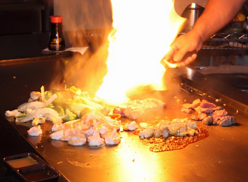 teppan grill food preparation with flaming grill