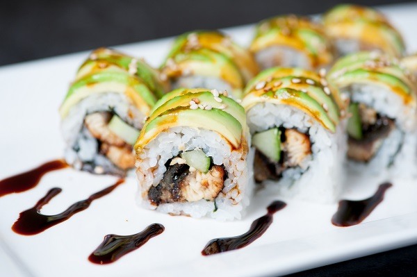 Osaka sushi roll on plate avocado