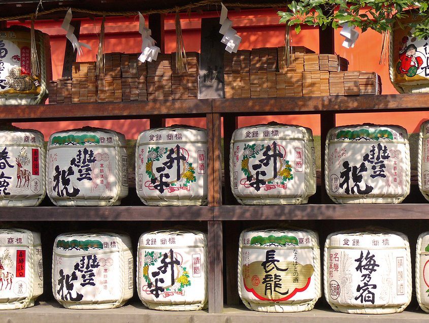 Japanese sake barrels stacked in a Shinto shrine.