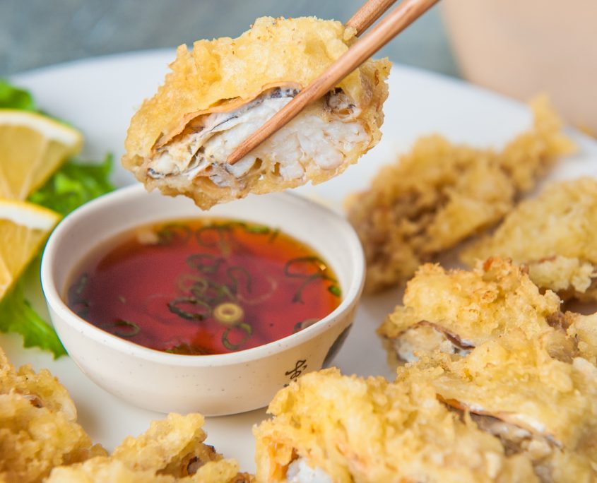 soft shell crab dipping chopsticks