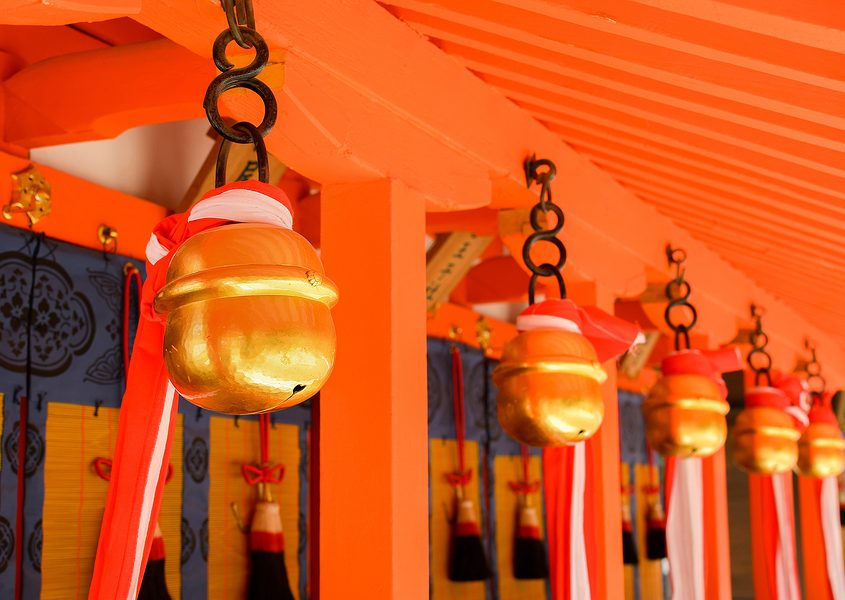 Japanese temple bells on the wall ringing for new year celebration