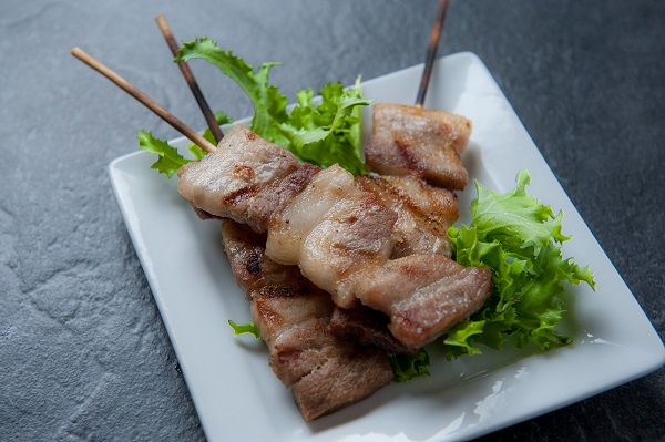 yakitori skewered grilled chicken dish displayed on plate