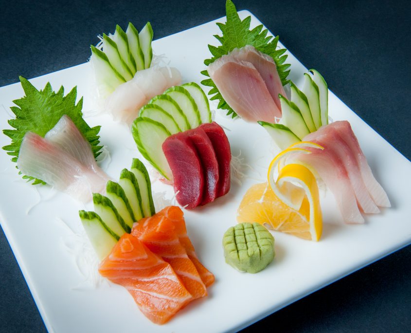 Sashimi plate fresh raw fish presented by Osaka Japanese Bistro